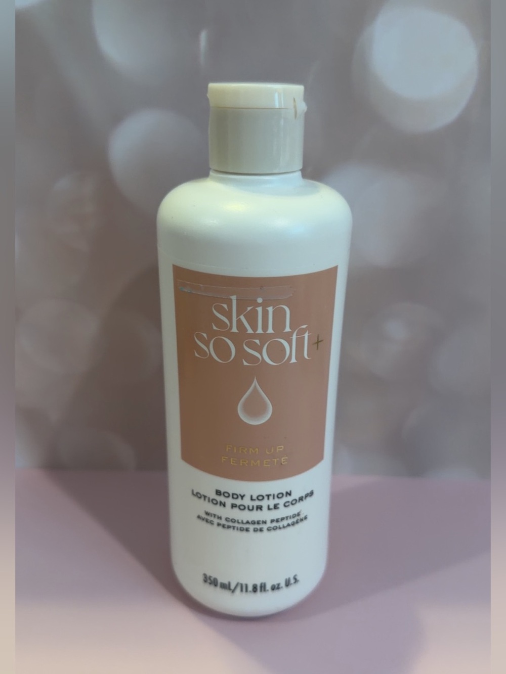 Avon Skin So Soft Firm up With Collagen and Peptides body lotion.